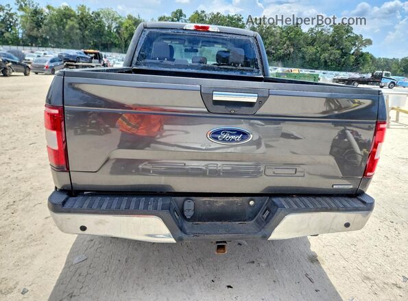 1FTFW1EG0JFA10305 2018 FORD F150 Black Vista interior delantera
