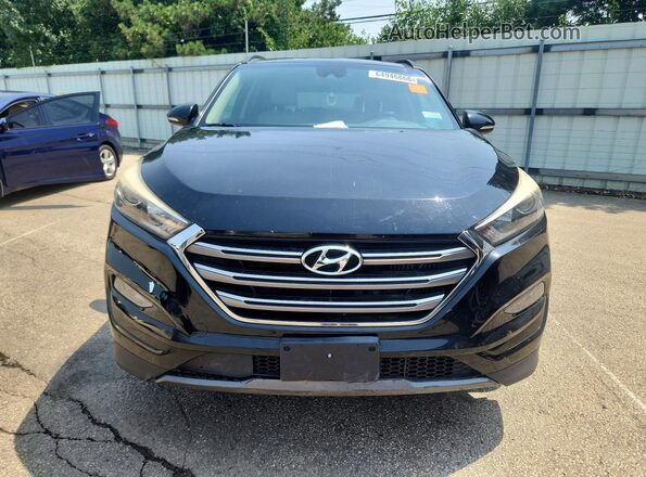 KM8J33A23GU129541 2016 HYUNDAI TUCSON Black უკანა ხედი