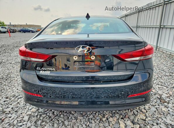 5NPD84LF5JH325734 2018 HYUNDAI ELANTRA Black Front interior view