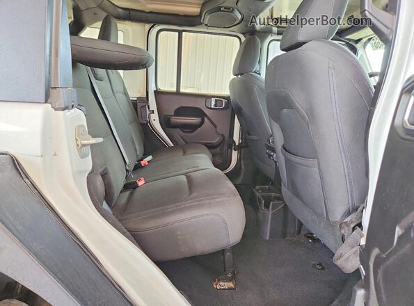 1C4HJXDG1JW122719 2018 JEEP WRANGLER White Widok wnętrza z tyłu