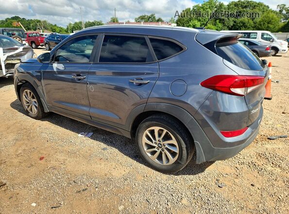 KM8J33A47GU228770 2016 HYUNDAI TUCSON Charcoal Trasero derecho