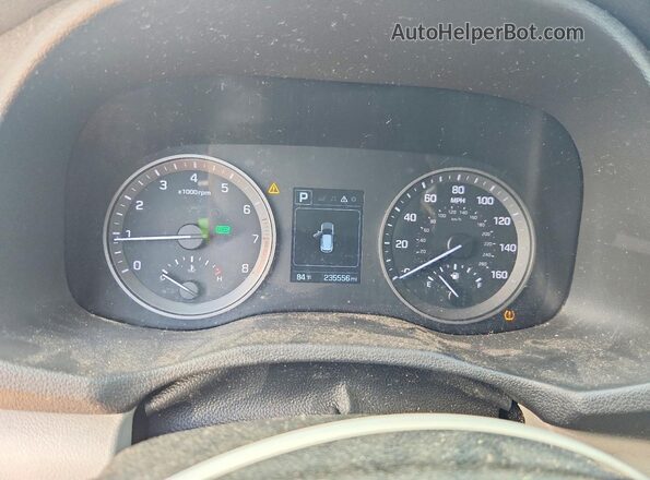KM8J33A47GU228770 2016 HYUNDAI TUCSON Charcoal Vista de los asientos traseros