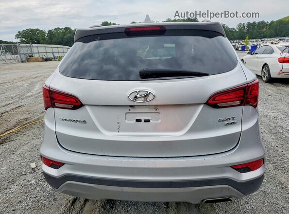 5XYZUDLB6HG383724 2017 HYUNDAI SANTA Серебряный Вид салона спереди