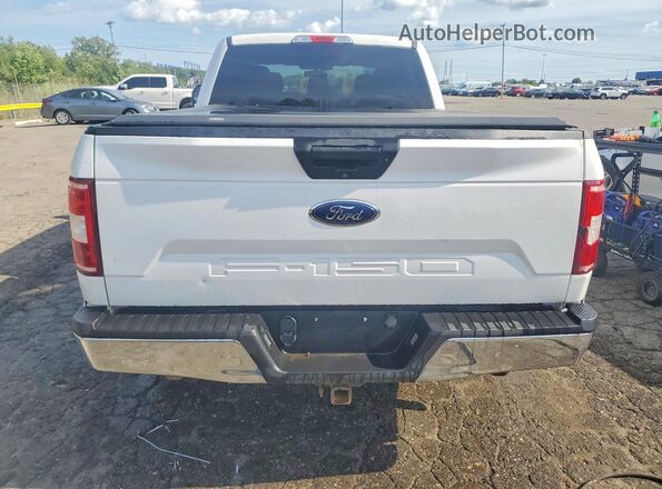 1FTFW1E59JFC66862 2018 FORD F150 White Widok wnętrza z przodu