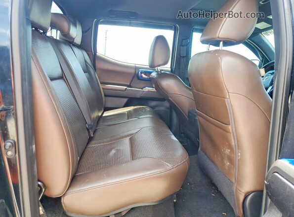 3TMEZ5CN5KM081609 2019 TOYOTA TACOMA Black Widok wnętrza z tyłu