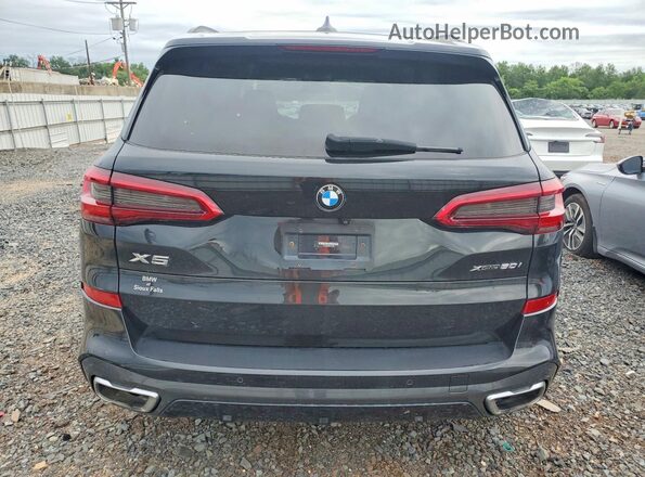 5UXJU2C52KLN49968 2019 BMW X5 Black Front interior view