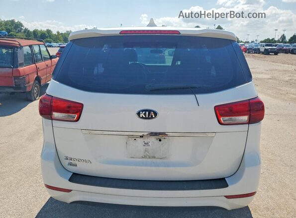 KNDMA5C11G6157401 2016 KIA SEDONA White Front interior view
