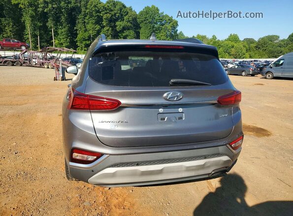 5NMS53AA2KH020482 2019 HYUNDAI SANTA FE Gray Vista interior delantera