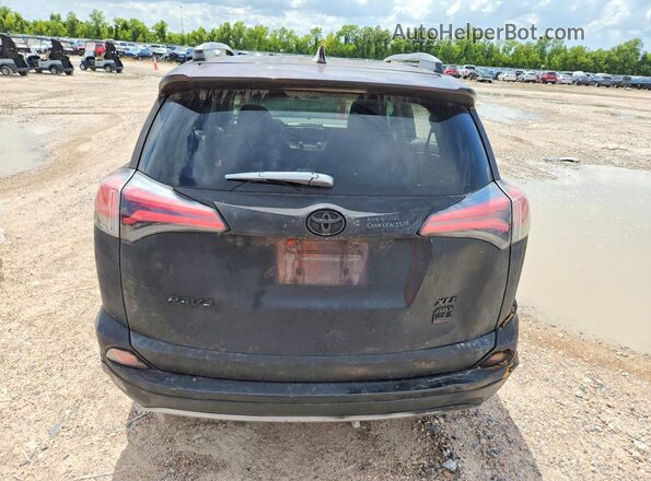 2T3RFREV3HW613770 2017 TOYOTA RAV4 Black Front interior view