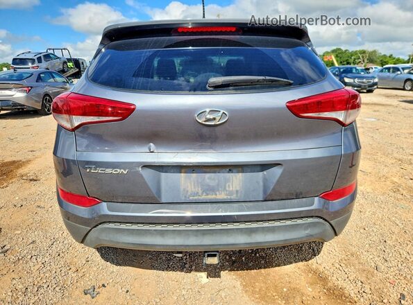 KM8J33A47GU228770 2016 HYUNDAI TUCSON Charcoal Vista interior delantera