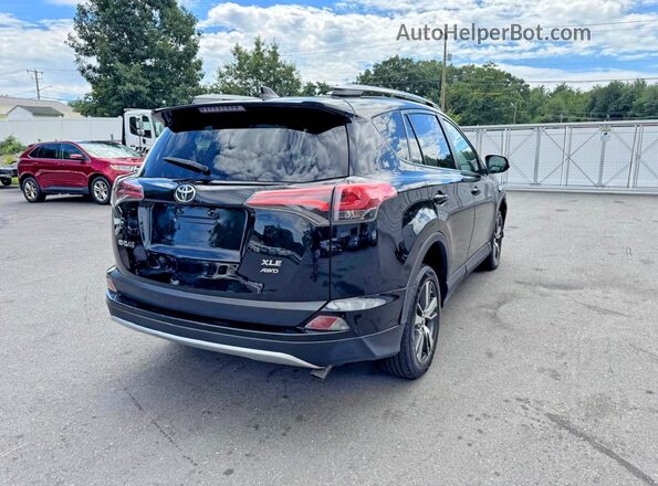 2T3RFREV4JW857885 2018 TOYOTA RAV4 Black Przód prawy