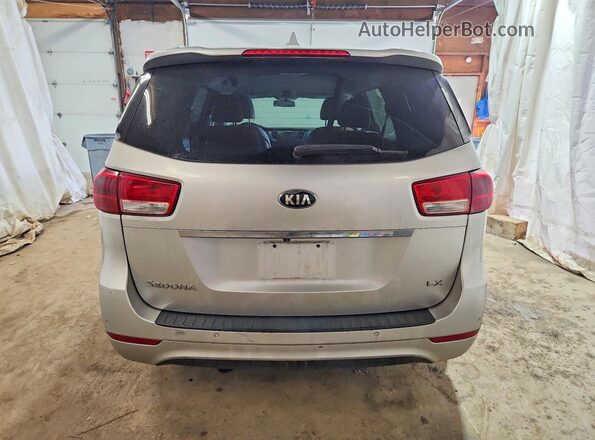 KNDMB5C19G6178073 2016 KIA SEDONA Silver Widok wnętrza z przodu