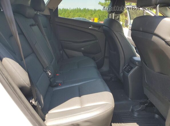 KM8J33A23HU276668 2017 HYUNDAI TUCSON Silver Vista interior trasera