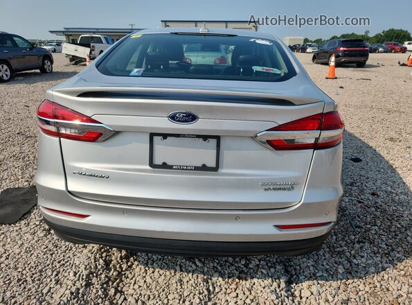 3FA6P0RU9KR187565 2019 FORD FUSION Серебряный Вид салона спереди