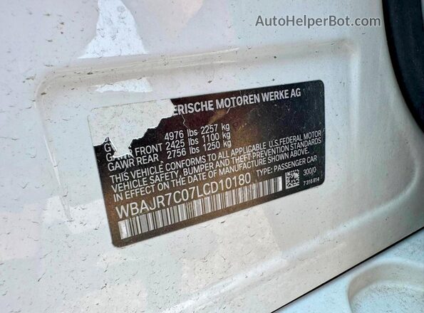 WBAJR7C07LCD10180 2020 BMW 5 SERIES White Widok wnętrza z tyłu