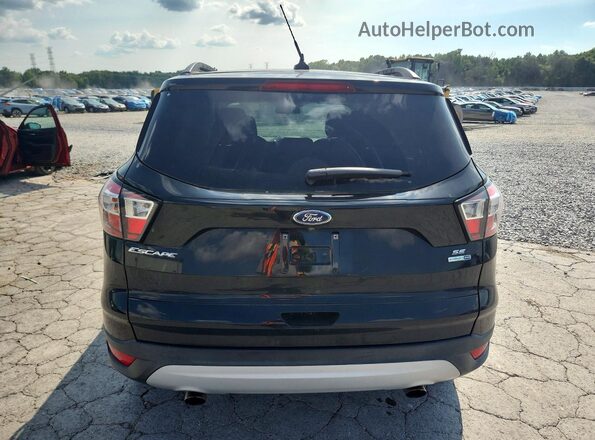 1FMCU9GD8JUD58046 2018 FORD ESCAPE Black წინა სალონის ხედი
