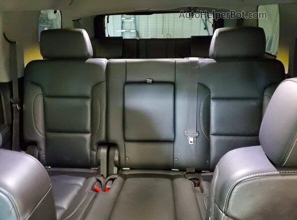 1GNSKBKC1KR159380 2019 CHEVROLET TAHOE Silver Rear interior view