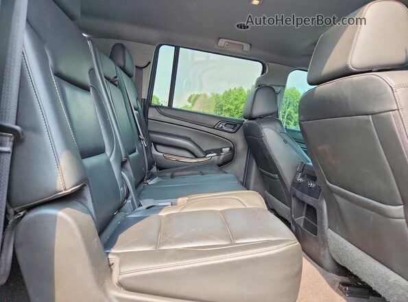 1GNSKHKCXKR113663 2019 CHEVROLET SUBURBAN Black Vista del compartimento del motor