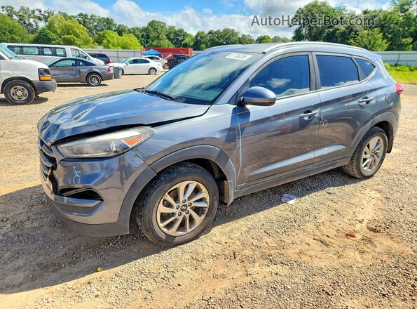 KM8J33A47GU228770 2016 HYUNDAI TUCSON Charcoal Trasero izquierdo