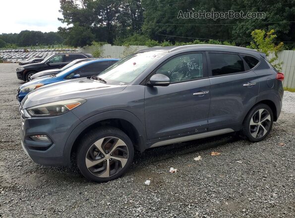 KM8J33A23HU352289 2017 HYUNDAI TUCSON Gray Rear left