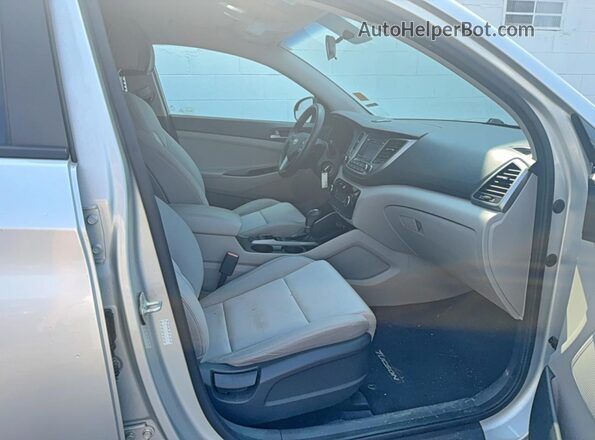 KM8J3CA29GU192143 2016 HYUNDAI TUCSON Silver Widok z tyłu