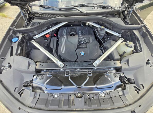5UXCW2C03L9A00871 2020 BMW X7 Черный Вид панели приборов