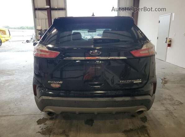 2FMPK3K96KBB43554 2019 FORD EDGE Black Front interior view