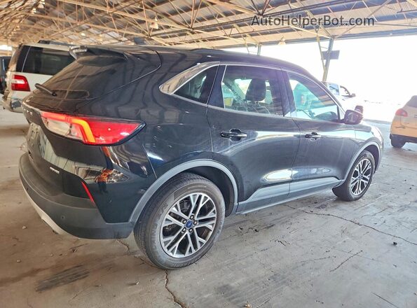 1FMCU9H65MUA64592 2021 FORD ESCAPE Black Przód prawy