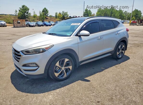 KM8J33A23HU276668 2017 HYUNDAI TUCSON Silver Trasero izquierdo