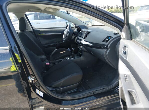 JA32U2FU3HU007577 2017 MITSUBISHI LANCER Black Widok wnętrza z przodu