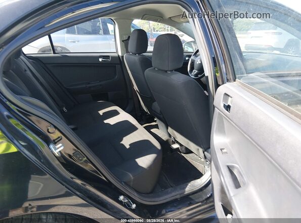 JA32U2FU3HU007577 2017 MITSUBISHI LANCER Black Widok naklejki z numerem VIN