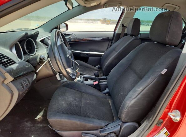 JA32U2FU5GU011399 2016 MITSUBISHI LANCER Red Widok wnętrza z przodu