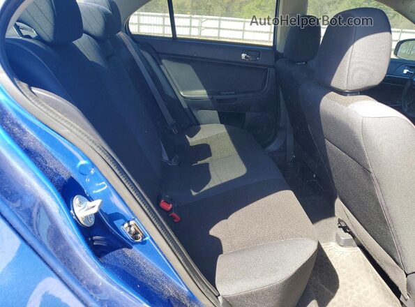 JA32U2FU6HU009825 2017 MITSUBISHI LANCER Blue Rear seats view