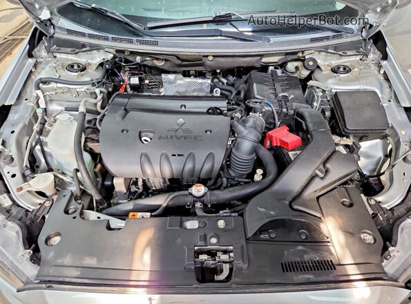 JA32U2FU8HU006506 2017 MITSUBISHI LANCER Silver Vista interior trasera