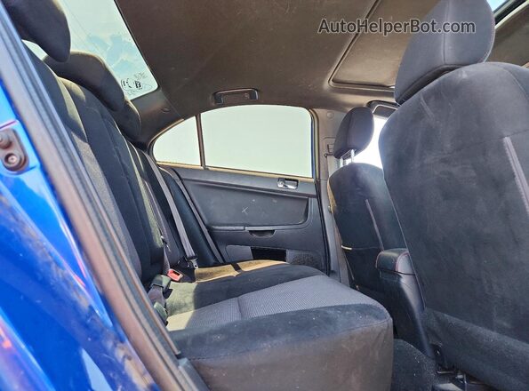 JA32U2FU8HU014332 2017 MITSUBISHI LANCER Blue Vista de los asientos traseros
