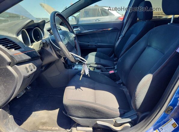 JA32U2FU8HU014332 2017 MITSUBISHI LANCER Blue Vista interior delantera