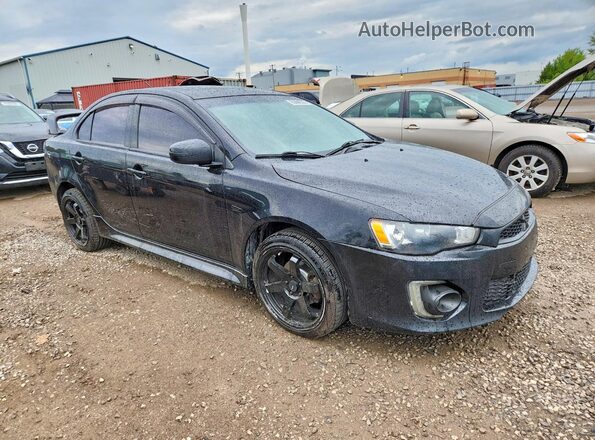 JA32V2FW1HU606069 2017 MITSUBISHI LANCER Black Front right