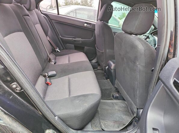 JA32V2FW1HU606069 2017 MITSUBISHI LANCER Black Rear seats view