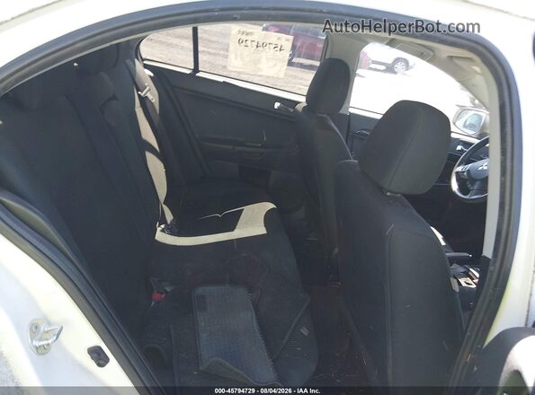 JA32V2FW9GU002882 2016 MITSUBISHI LANCER White VIN կոդի պիտակի տեսք