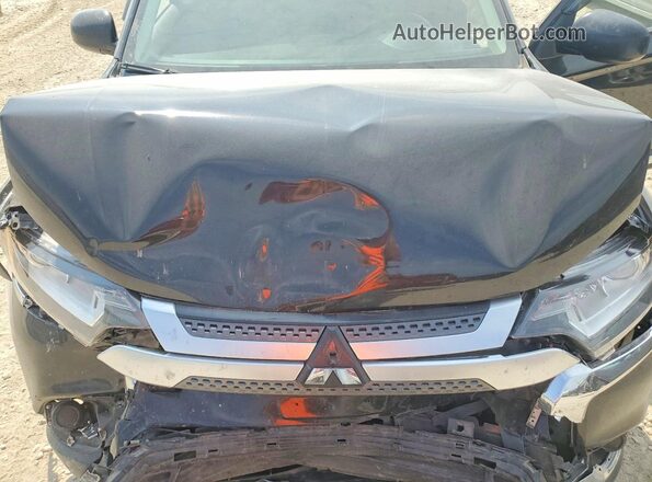 JA4AD2A32LZ005997 2020 MITSUBISHI OUTLANDER Black Widok wnętrza z tyłu