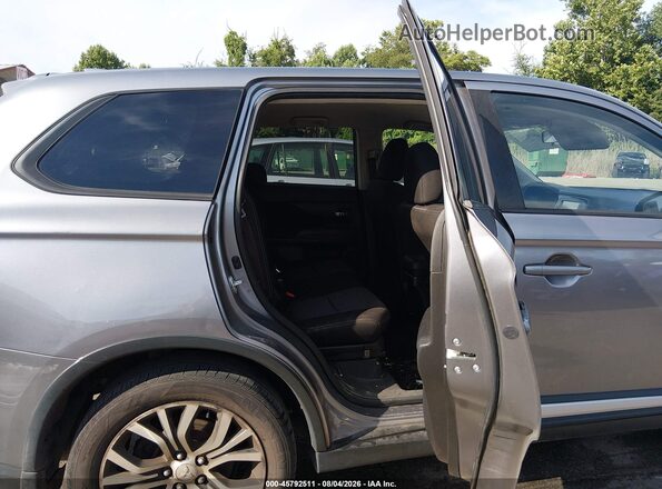 JA4AD2A3XJZ063000 2018 MITSUBISHI OUTLANDER Gray Vista de la etiqueta del VIN
