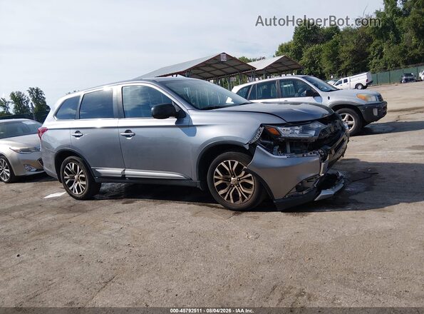 JA4AD2A3XJZ063000 2018 MITSUBISHI OUTLANDER Gray Vista interior trasera
