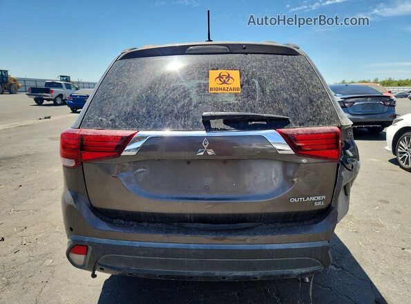 JA4AD3A34GZ007312 2016 MITSUBISHI OUTLANDER Brown Հետևի տեսք