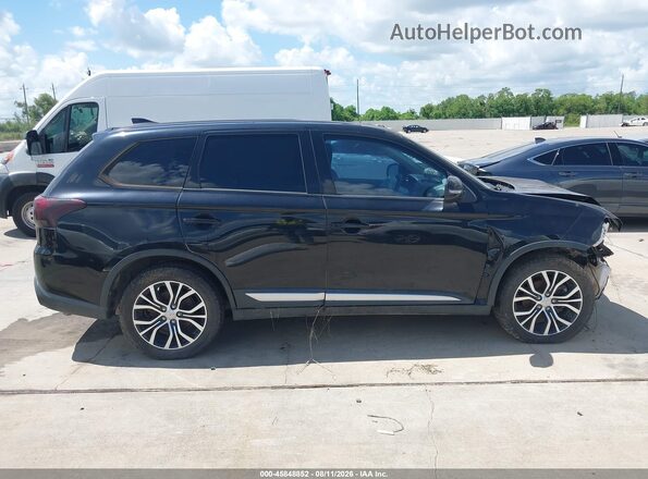 JA4AD3A34JJ004061 2018 MITSUBISHI OUTLANDER Black Rear interior view