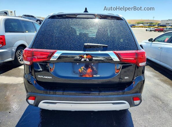 JA4AD3A34LZ030731 2020 MITSUBISHI OUTLANDER Черный Вид сзади