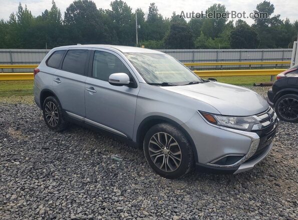 JA4AD3A38HZ021750 2017 MITSUBISHI OUTLANDER Серебряный Передняя правая четверть