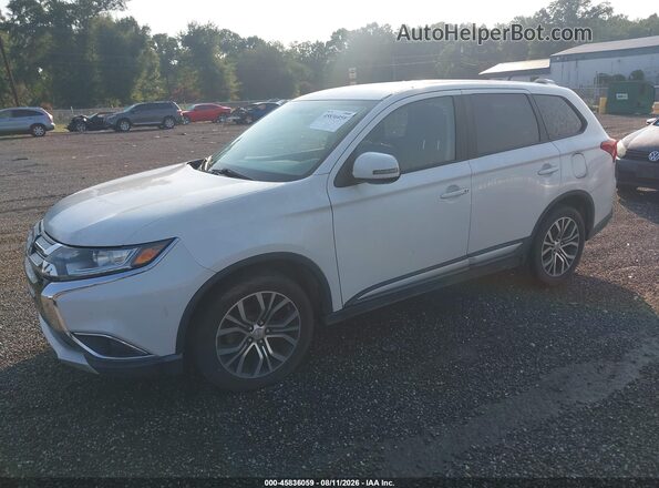 JA4AD3A3XGZ001739 2016 MITSUBISHI OUTLANDER White Front left