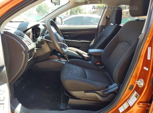 JA4AP3AU1LU017013 2020 MITSUBISHI OUTLANDER Orange Widok wnętrza z przodu