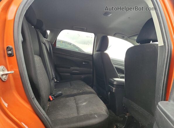 JA4AP3AU3LU016221 2020 MITSUBISHI OUTLANDER Orange Vista interior trasera
