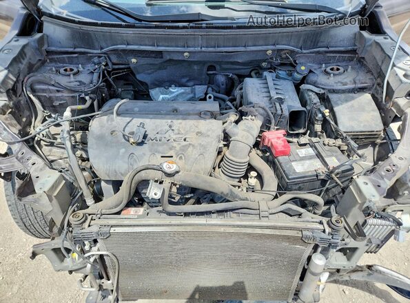 JA4AP3AU5LU015457 2020 MITSUBISHI OUTLANDER Brown Engine compartment view
